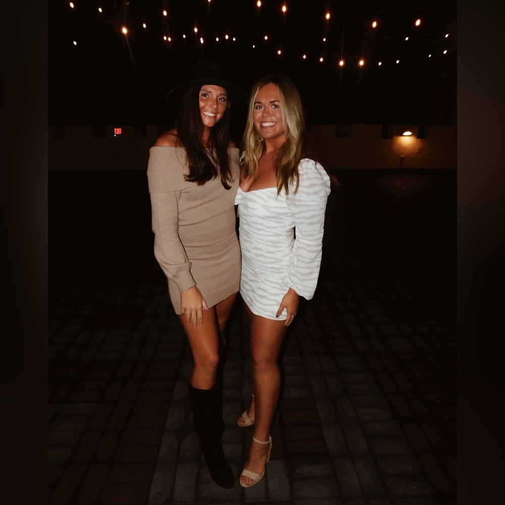 Long sleeve open back boutique dress